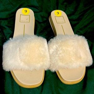 Fluffy slides shoes.